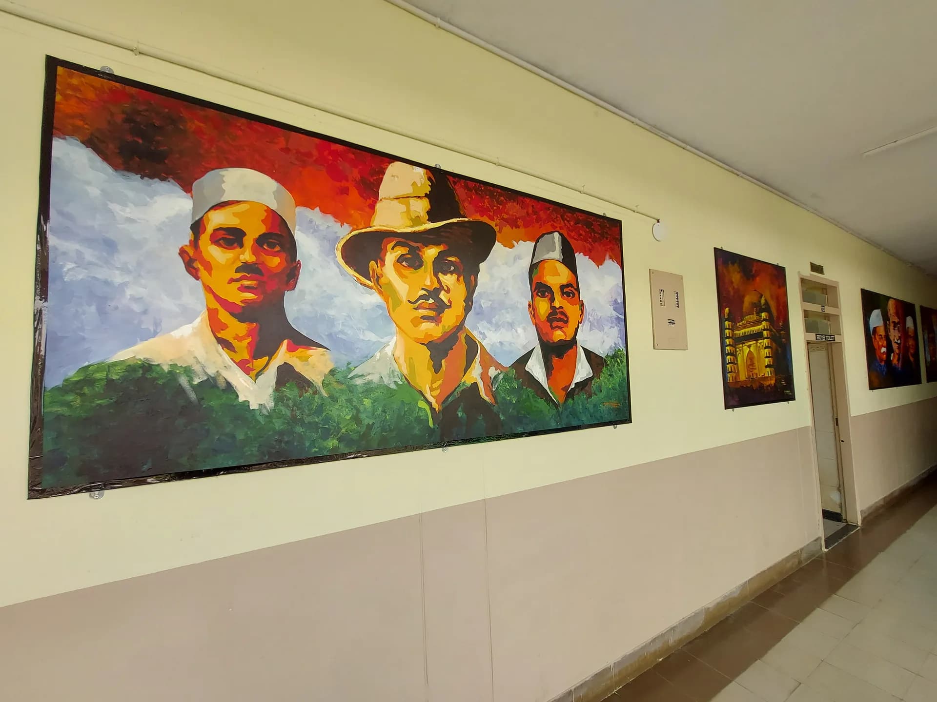 Corridor hung with large painted portraits of Indian freedom fighters