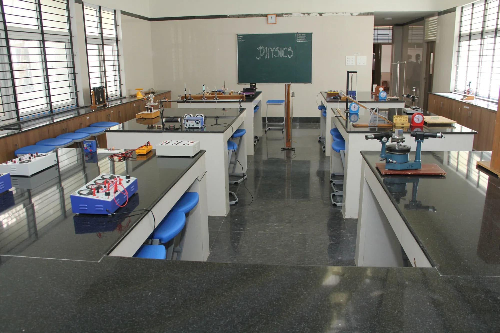 The physics laboratory at PSSEMR School, with an optical bench and meters