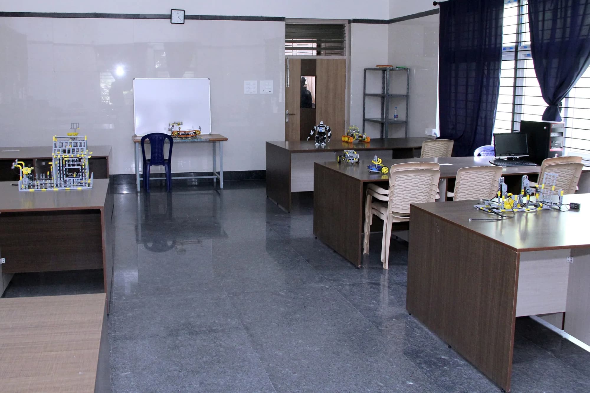 The robotics laboratory at PSSEMR School, part-built kits on the desks