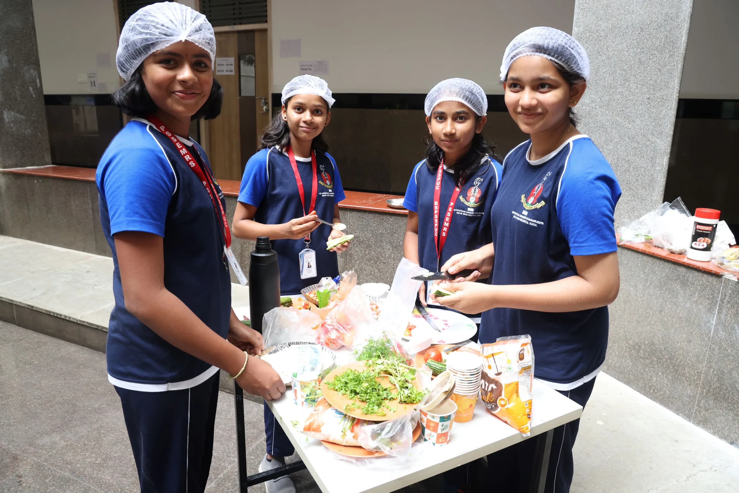 Students preparing food during a socially useful productive work session at PSSEMR School